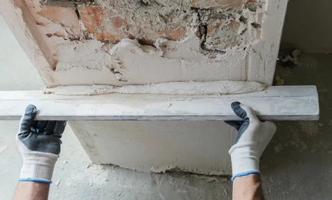 Reinigen gevelbepleistering